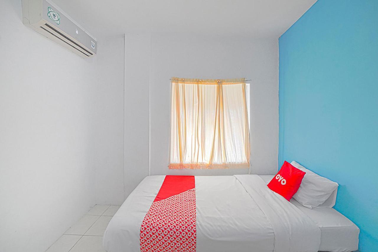 Oyo 90637 Rumah Ni Karo Medan Esterno foto